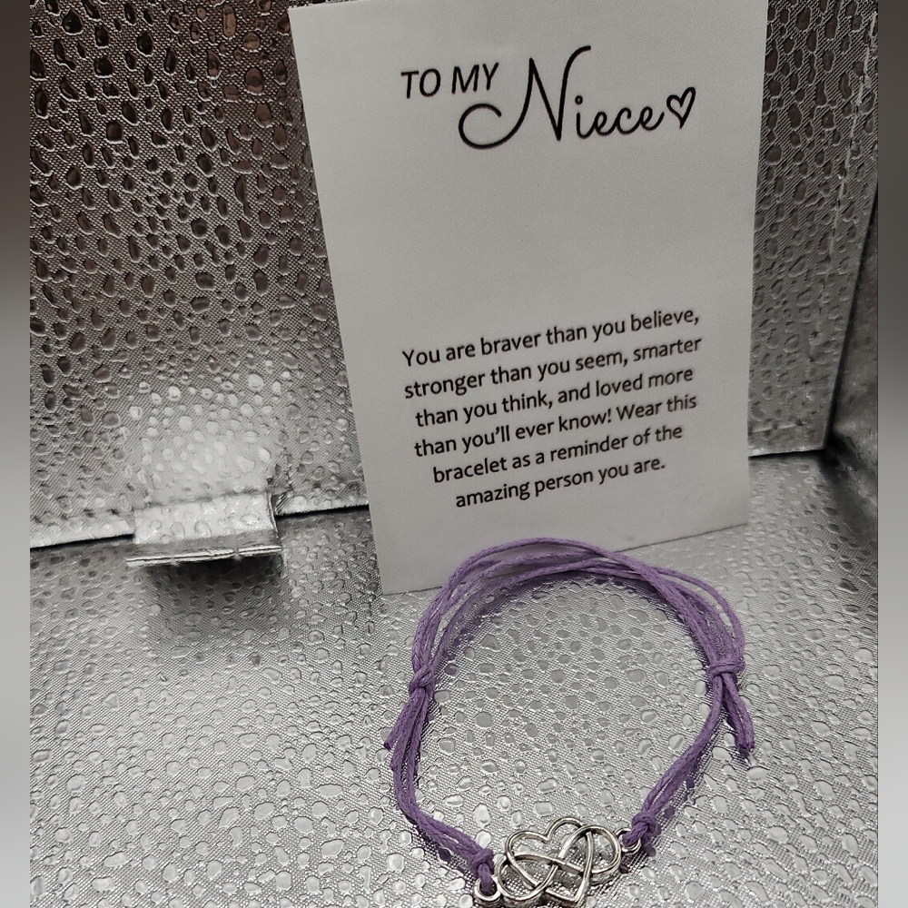 NWOT Silver Heart Knot Bracelet with Purple Cord For A Niece